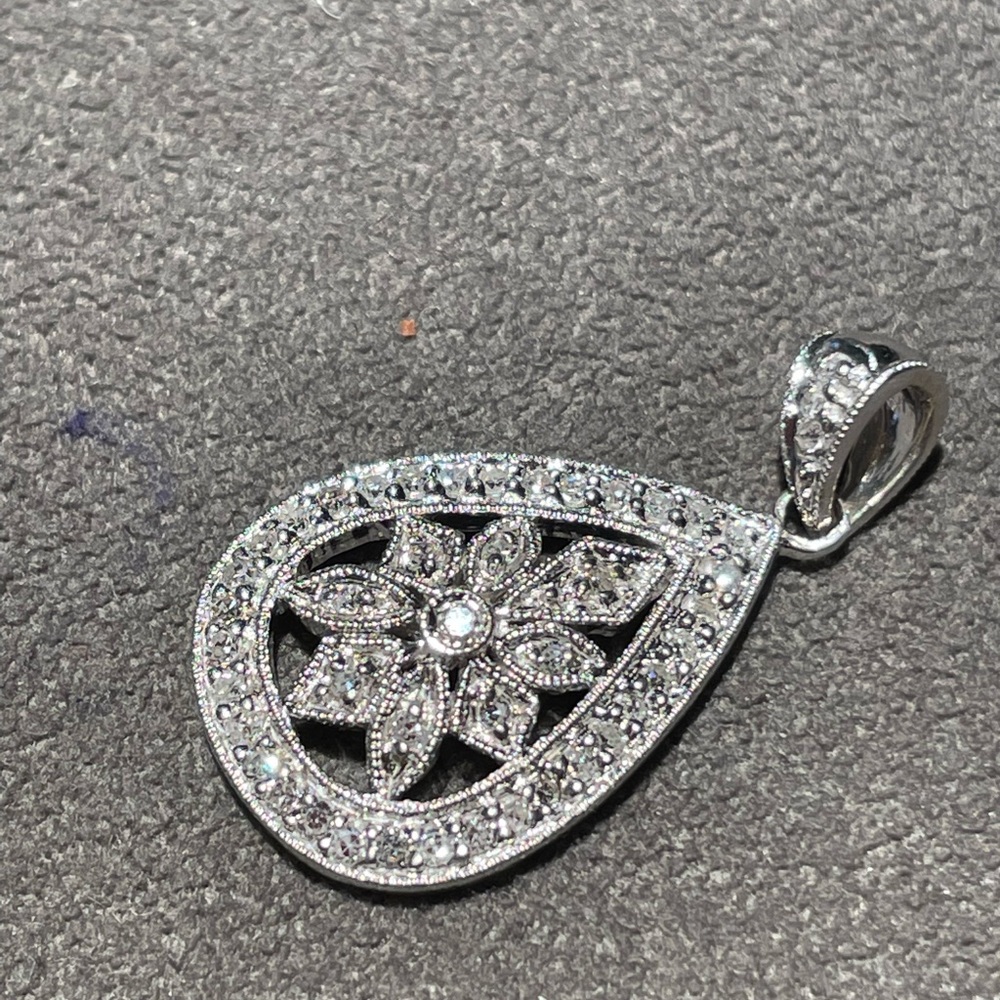 White gold and pave diamond pendant